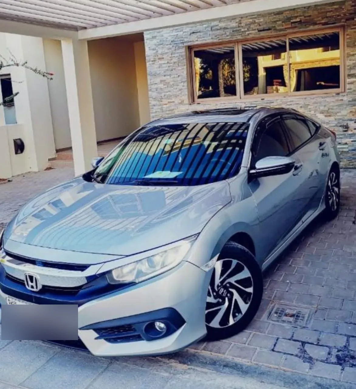 Honda Civic — CarLift Sharjah to Dubai car lift Sharjah